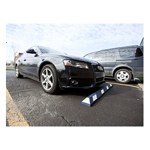 rubber car stops parking lot curbs handicapped signs reserved parking signs houston